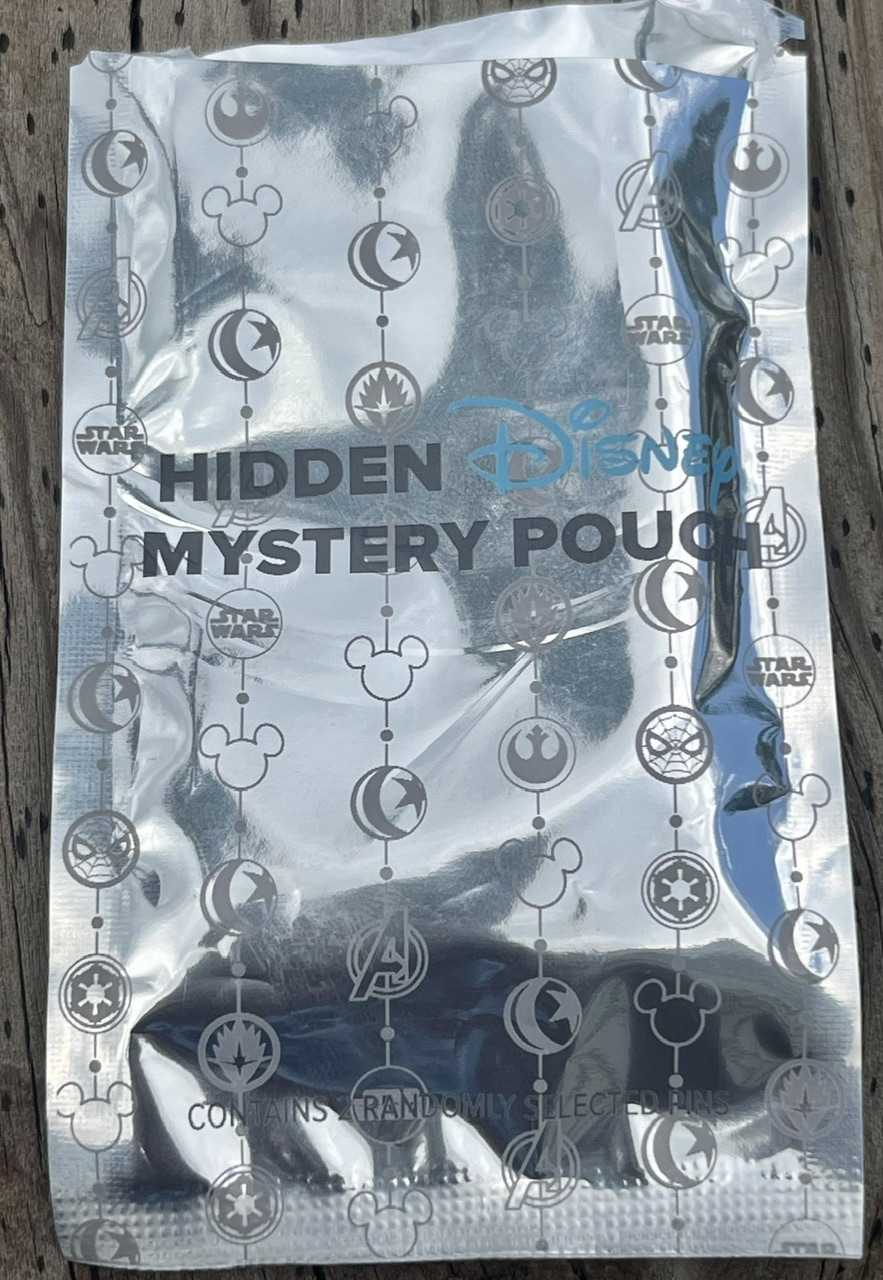 2024 Hidden Disney Mystery Pin Pouches Released - Disney Pins Blog